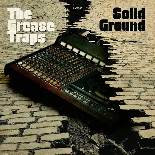 GREASE TRAPS / SOLID GROUNDΥʥ쥳ɥ㥱å ()