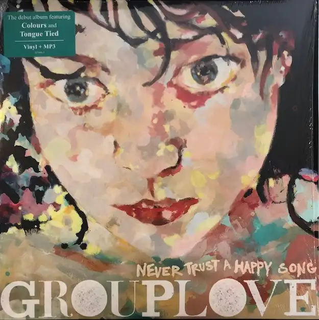 GROUPLOVE / NEVER TRUST A HAPPY SONG
